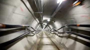 The cables snake along the technical interconnection tunnel